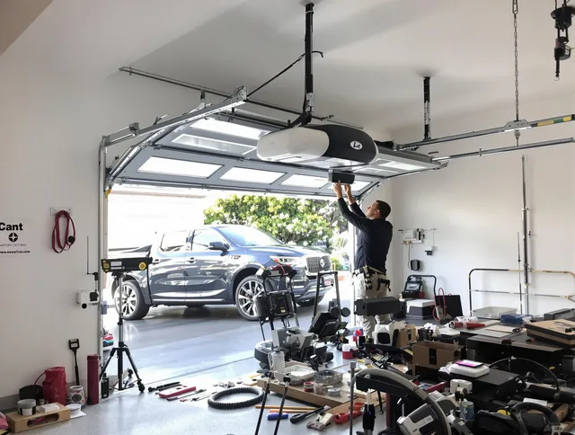 North Port Garage Door Repair specialist installing smart garage door opener system in North Port home