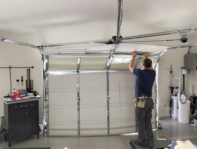 North Port Garage Door Repair specialist performing precise section replacement on North Port garage door