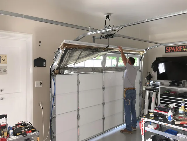 Garage door section replacement by North Port Garage Door Repair in North Port