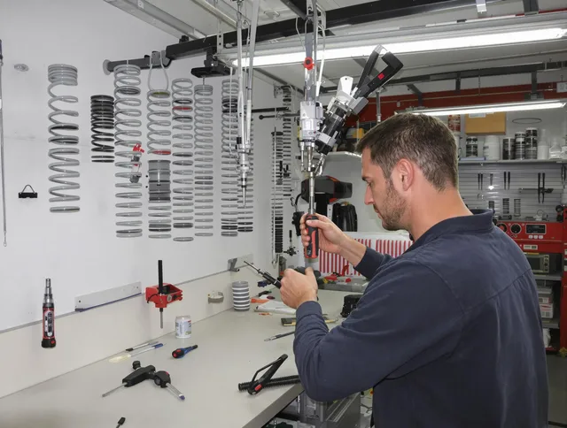 North Port Garage Door Repair safety certified technician performing precision spring replacement in North Port